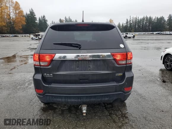 ✅ 2011 Jeep Grand Cherokee Laredo • VIN: 1J4RR4GG9BC705592 • Lot: 93147795. Listed on Copart with 221,481 mi. Free auction sales archive from the USA and detailed vehicle history report at DreamBid. Image 6.