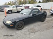 ✅ 1999 Mazda MX-5 Miata • VIN: JM1NB3539X0138733 • Lot: 86450855. Listed on Copart with 149,605 mi. Free auction sales archive from the USA and detailed vehicle history report at DreamBid. Image 1.