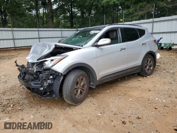✅ 2014 Hyundai Santa Fe • VIN: 5XYZU3LB7EG206492 • Лот: 69850035. Опубликован ранее на Copart с пробегом Не указан. Бесплатный доступ к архиву аукционных продаж из США и подробный отчёт об истории автомобиля на DreamBid. Изображение 1.