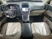 ✅ 2018 Lincoln MKX Reserve • VIN: 2LMPJ6LR5JBL12680 • Lot: 65388825. Listed on Copart with 121,568 mi. Free auction sales archive from the USA and detailed vehicle history report at DreamBid. Image 8.