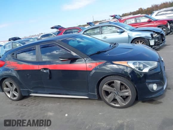 ✅ 2014 Hyundai Veloster Turbo • VIN: KMHTC6AE3EU183231 • Lot: 43641241. Listed on IAAI with 154,712 mi. Free auction sales archive from the USA and detailed vehicle history report at DreamBid. Image 13.