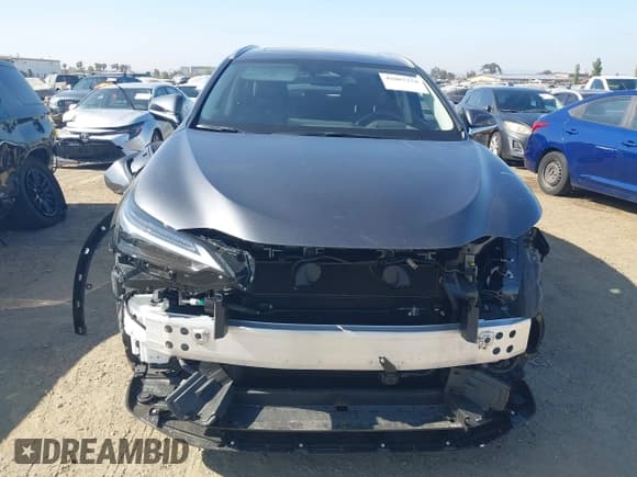 ✅ 2025 Lexus NX 450h+ Luxury • VIN: JTJHKCFZ2S2057714 • Lot: 42867278. Wystawiony na IAAI z przebiegiem 6 728 mil. Bezpłatny archiwum sprzedaży aukcyjnych z USA i szczegółowy raport historii pojazdu na DreamBid. Zdjęcie 13.