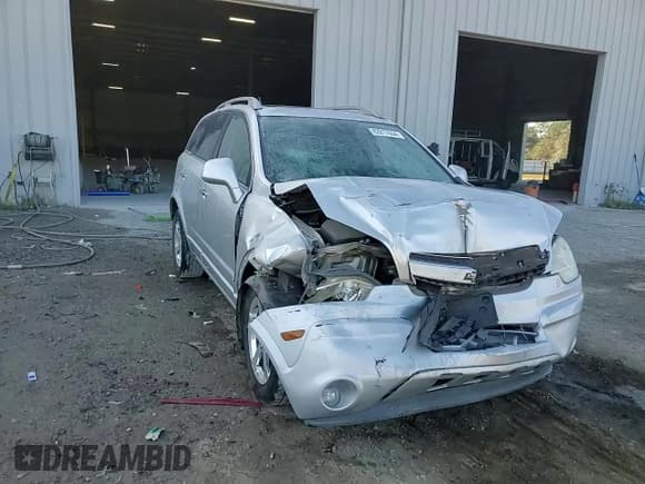 ✅ 2014 Chevrolet Captiva Sport LT • VIN: 3GNAL3EK0ES508077 • Лот: 82817054. Опубликован ранее на Copart с пробегом 141 033 миль. Бесплатный доступ к архиву аукционных продаж из США и подробный отчёт об истории автомобиля на DreamBid. Изображение 14.