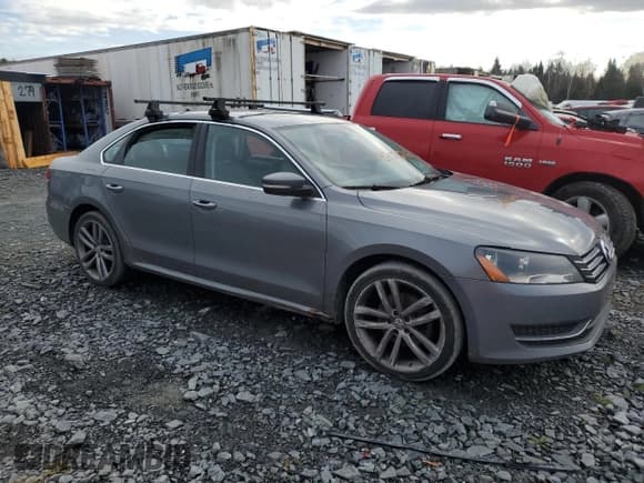 ✅ 2013 Volkswagen Passat SE • VIN: 1VWBH7A38DC027404 • Lot: 87072765. Listed on Copart with 182,164 mi. Free auction sales archive from the USA and detailed vehicle history report at DreamBid. Image 4.