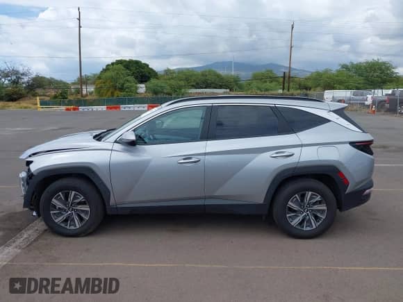 2023 Hyundai Tucson Blue z VIN KM8JBCA16PU097422, wystawiony jako IAAI lot #42138545 z przebiegiem 14 826 mil mil oraz . Historia ofert i sprzedaży dostępna na DreamBid. Obrazek 15.