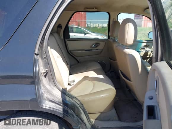 2006 Mercury Mariner Luxury z VIN 4M2YU56186DJ00220, wystawiony jako IAAI lot #42174056 z przebiegiem 208 820 mil mil oraz . Historia ofert i sprzedaży dostępna na DreamBid. Obrazek 8.