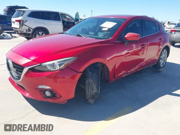 ✅ 2015 Mazda 3 S Grand Touring • VIN: JM1BM1M3XF1270671 • Лот: 43552704. Опубликован ранее на IAAI с пробегом 124 055 миль. Бесплатный доступ к архиву аукционных продаж из США и подробный отчёт об истории автомобиля на DreamBid. Изображение 21.