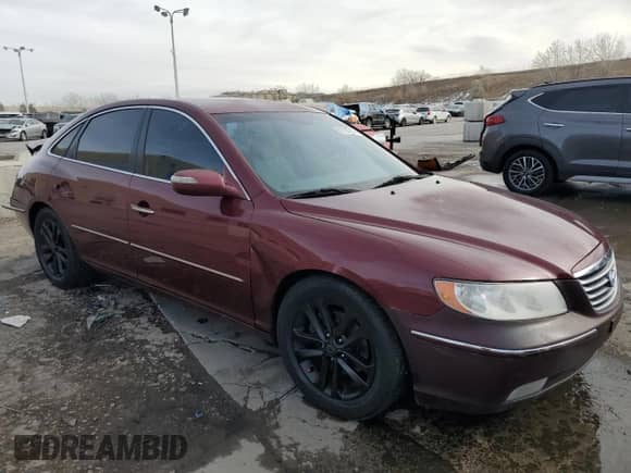 2009 Hyundai Azera Limited с VIN KMHFC46F49A358970, выставлен на аукционе Copart как лот 82125714 с пробегом 208 090 миль миль и Списание • Salvage title. История ставок и продаж доступна на DreamBid. Изображение 4.