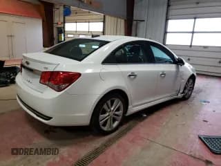 ✅ 2015 Chevrolet Cruze LTZ • VIN: 1G1PG5SB0F7271221 • Lot: 70663042. Listed on Copart with 62,086 mi. Free auction sales archive from the USA and detailed vehicle history report at DreamBid. Image 3.