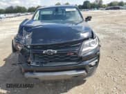 ✅ 2021 Chevrolet Colorado 4WD Z71 • VIN: 1GCGTDEN9M1175316 • Lot: 81660645. Listed on Copart with 90,820 mi. Free auction sales archive from the USA and detailed vehicle history report at DreamBid. Image 5.