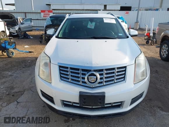 ✅ 2013 Cadillac SRX • VIN: 3GYFNAE36DS618498 • Lot: 42454872. Wystawiony na IAAI z przebiegiem 161 236 mil. Bezpłatny archiwum sprzedaży aukcyjnych z USA i szczegółowy raport historii pojazdu na DreamBid. Zdjęcie 12.