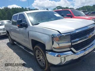 ✅ 2016 Chevrolet Silverado 1500 LT • VIN: 3GCUKREC0GG179973 • Лот: 42513574. Опубликован ранее на IAAI с пробегом 201 278 миль. Бесплатный доступ к архиву аукционных продаж из США и подробный отчёт об истории автомобиля на DreamBid. Изображение 1.
