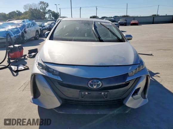 ✅ 2021 Toyota Prius LE • VIN: JTDKAMFPXM3185342 • Lot: 85370955. Listed on Copart with Not provided. Free auction sales archive from the USA and detailed vehicle history report at DreamBid. Image 5.