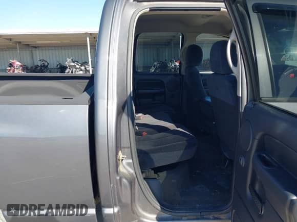 2003 Dodge 1500 ST z VIN 1D7HA18N33S171197, wystawiony jako IAAI lot #43328322 z przebiegiem 214 176 mil mil oraz . Historia ofert i sprzedaży dostępna na DreamBid. Obrazek 8.