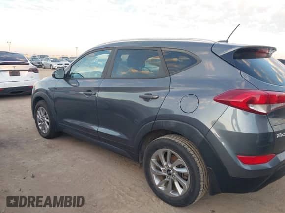 2016 Hyundai Tucson SE z VIN KM8J33A46GU235712, wystawiony jako IAAI lot #43602206 z przebiegiem 88 238 mil mil oraz . Historia ofert i sprzedaży dostępna na DreamBid. Obrazek 14.