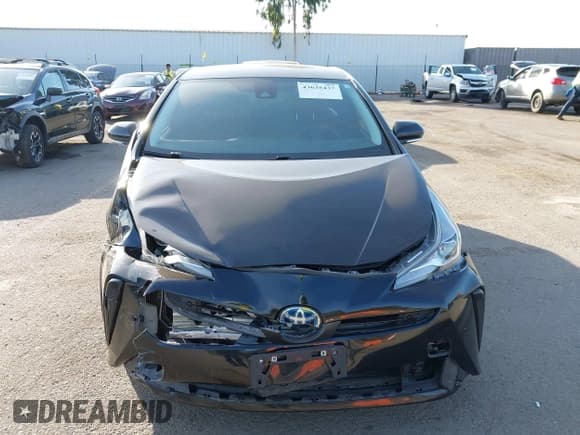 ✅ 2021 Toyota Prius LE • VIN: JTDKAMFUXM3147857 • Lot: 43635437. Wystawiony na IAAI z przebiegiem 105 003 mil. Bezpłatny archiwum sprzedaży aukcyjnych z USA i szczegółowy raport historii pojazdu na DreamBid. Zdjęcie 13.