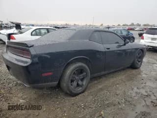 ✅ 2013 Dodge Challenger SXT • VIN: 2C3CDYAG5DH675912 • Lot: 82213544. Wystawiony na Copart z przebiegiem 76 646 mil. Bezpłatny archiwum sprzedaży aukcyjnych z USA i szczegółowy raport historii pojazdu na DreamBid. Zdjęcie 3.