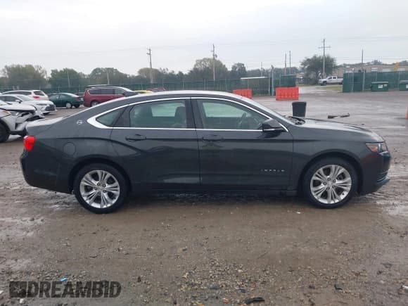 ✅ 2015 Chevrolet Impala LT • VIN: 1G1115SL4FU143565 • Лот: 43400334. Опубликован ранее на IAAI с пробегом 122 839 миль. Бесплатный доступ к архиву аукционных продаж из США и подробный отчёт об истории автомобиля на DreamBid. Изображение 13.