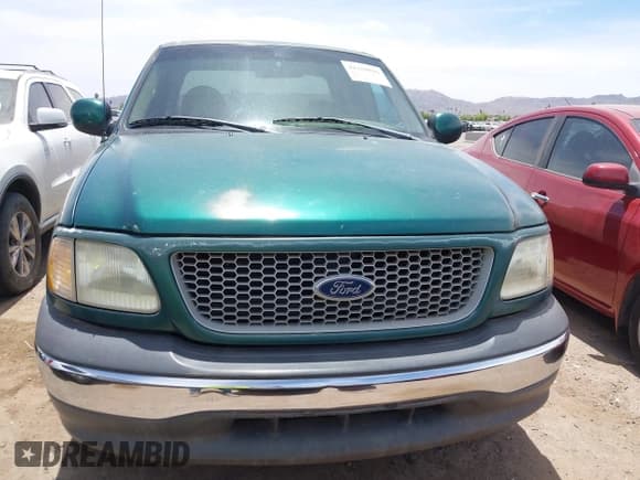 ✅ 1999 Ford F-150 XL • VIN: 1FTRX17L5XKA29212 • Lot: 42359916. Listed on IAAI with 131,137 mi. Free auction sales archive from the USA and detailed vehicle history report at DreamBid. Image 6.