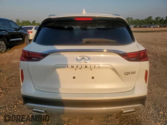 ✅ 2024 Infiniti QX50 Luxe • VIN: 3PCAJ5BA6RF104043 • Лот: 59015075. Опубликован ранее на Copart с пробегом 13 276 миль. Бесплатный доступ к архиву аукционных продаж из США и подробный отчёт об истории автомобиля на DreamBid. Изображение 6.