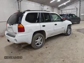 ✅ 2004 GMC Envoy SLE • VIN: 1GKDT13SX42364159 • Lot: 43719324. Listed on IAAI with 139,544 mi. Free auction sales archive from the USA and detailed vehicle history report at DreamBid. Image 4.