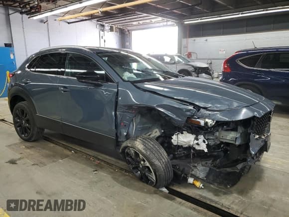 ✅ 2024 Mazda CX-30 Premium • VIN: 3MVDMBDY6RM602931 • Лот: 63409815. Опубликован ранее на Copart с пробегом 10 392 миль. Бесплатный доступ к архиву аукционных продаж из США и подробный отчёт об истории автомобиля на DreamBid. Изображение 4.