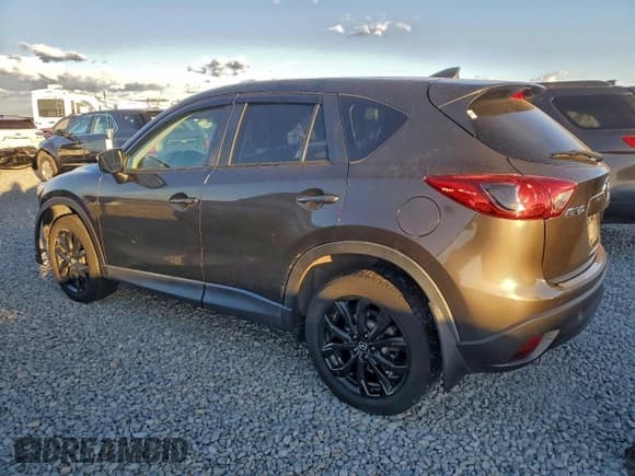 ✅ 2016 Mazda CX-5 Grand Touring • VIN: JM3KE2DY4G0906899 • Lot: 93922385. Wystawiony na Copart z przebiegiem 81 571 mil. Bezpłatny archiwum sprzedaży aukcyjnych z USA i szczegółowy raport historii pojazdu na DreamBid. Zdjęcie 2.