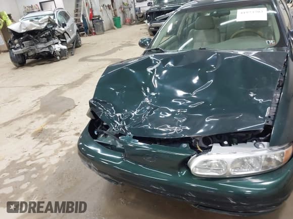 ✅ 2001 Oldsmobile Alero GL2 • VIN: 1G3NL52T91C252959 • Lot: 41973703. Listed on IAAI with 77,619 mi. Free auction sales archive from the USA and detailed vehicle history report at DreamBid. Image 6.