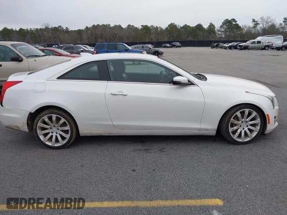 ✅ 2015 Cadillac ATS Standard AWD • VIN: 1G6AG1RX0F0127073 • Lot: 41296448. Listed on IAAI with 119,718 mi. Free auction sales archive from the USA and detailed vehicle history report at DreamBid. Image 13.