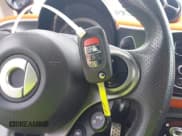 ✅ 2016 Smart fortwo Passion • VIN: WMEFJ5DA7GK059750 • Лот: 42931318. Опубликован ранее на IAAI с пробегом 83 880 миль. Бесплатный доступ к архиву аукционных продаж из США и подробный отчёт об истории автомобиля на DreamBid. Изображение 11.