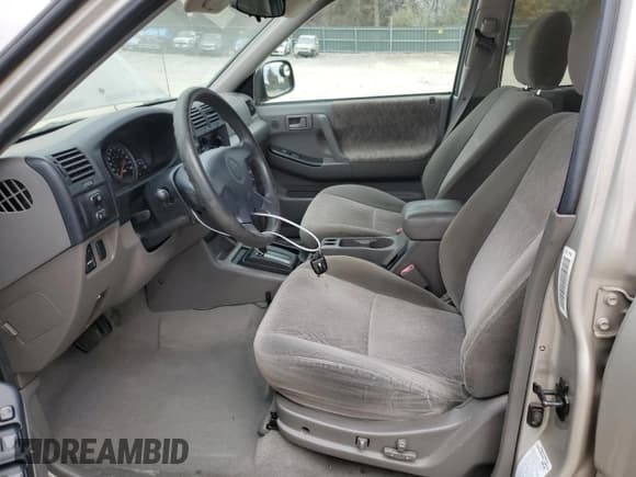 ✅ 2004 Isuzu Rodeo S • VIN: 4S2CK58Y744305349 • Lot: 82386444. Listed on Copart with 162,752 mi. Free auction sales archive from the USA and detailed vehicle history report at DreamBid. Image 6.