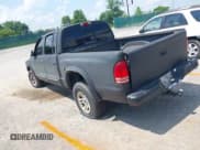 ✅ 2004 Dodge Dakota SLT • VIN: 1D7HG48N34S693877 • Lot: 42423197. Listed on IAAI with 163,141 mi. Free auction sales archive from the USA and detailed vehicle history report at DreamBid. Image 3.