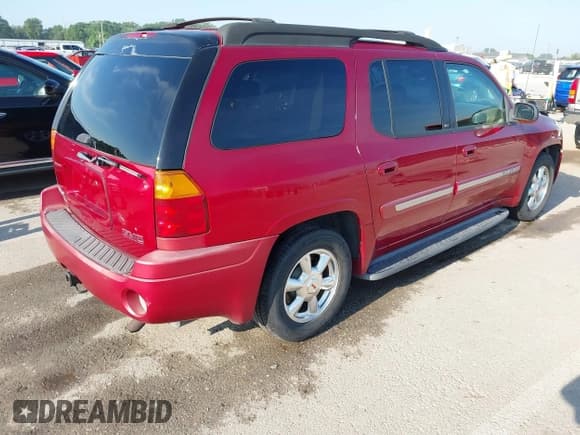 ✅ 2003 GMC Envoy SLE • VIN: 1GKET16S636122380 • Lot: 42618528. Listed on IAAI with 219,271 mi. Free auction sales archive from the USA and detailed vehicle history report at DreamBid. Image 4.