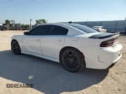 ✅ 2022 Dodge Charger R/T • VIN: 2C3CDXCT0NH157678 • Lot: 80244775. Listed on Copart with 80,305 mi. Free auction sales archive from the USA and detailed vehicle history report at DreamBid. Image 2.