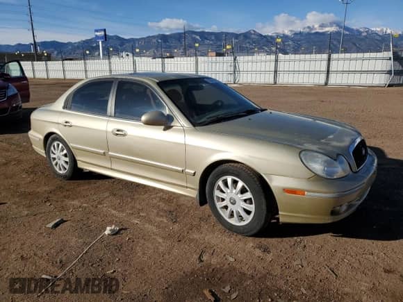 2003 Hyundai Sonata GLS z VIN KMHWF35H33A874765, wystawiony jako Copart lot #43804495 z przebiegiem 168 242 mil mil oraz Szkoda całkowita • Salvage title. Historia ofert i sprzedaży dostępna na DreamBid. Obrazek 4.