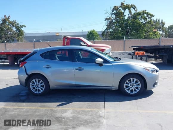 ✅ 2014 Mazda 3 i Touring • VIN: JM1BM1L75E1100396 • Lot: 42942054. Listed on IAAI with 59,722 mi. Free auction sales archive from the USA and detailed vehicle history report at DreamBid. Image 13.