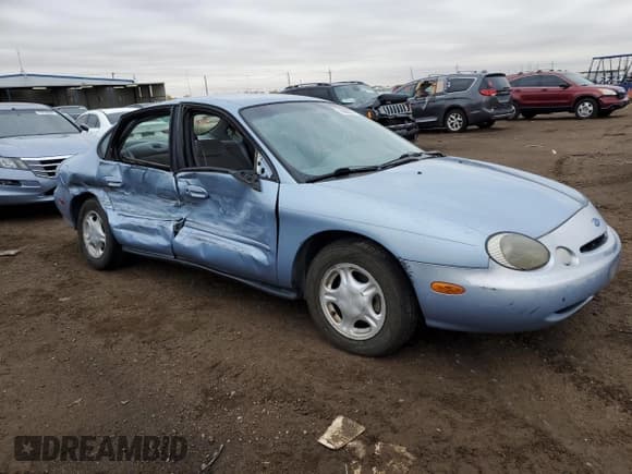 ✅ 1997 Ford Taurus GL • VIN: 1FALP52U3VG215530 • Lot: 79305074. Listed on Copart with 165,710 mi. Free auction sales archive from the USA and detailed vehicle history report at DreamBid. Image 4.