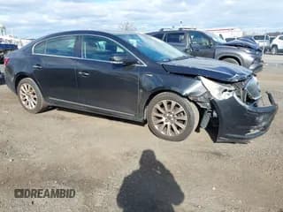 ✅ 2013 Buick LaCrosse Leather • VIN: 1G4GC5E35DF294922 • Lot: 43706320. Listed on IAAI with 98,392 mi. Free auction sales archive from the USA and detailed vehicle history report at DreamBid. Image 1.