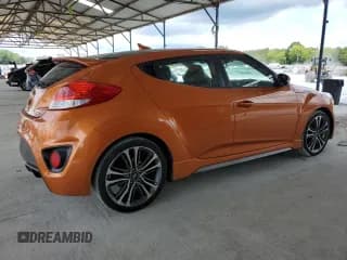 ✅ 2016 Hyundai Veloster Turbo • VIN: KMHTC6AE9GU284857 • Lot: 83818064. Wystawiony na Copart z przebiegiem 123 133 mil. Bezpłatny archiwum sprzedaży aukcyjnych z USA i szczegółowy raport historii pojazdu na DreamBid. Zdjęcie 3.