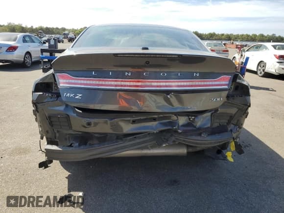 ✅ 2018 Lincoln MKZ Hybrid Premiere • VIN: 3LN6L5KU3JR615296 • Лот: 71414524. Опубликован ранее на Copart с пробегом 65 257 миль. Бесплатный доступ к архиву аукционных продаж из США и подробный отчёт об истории автомобиля на DreamBid. Изображение 6.