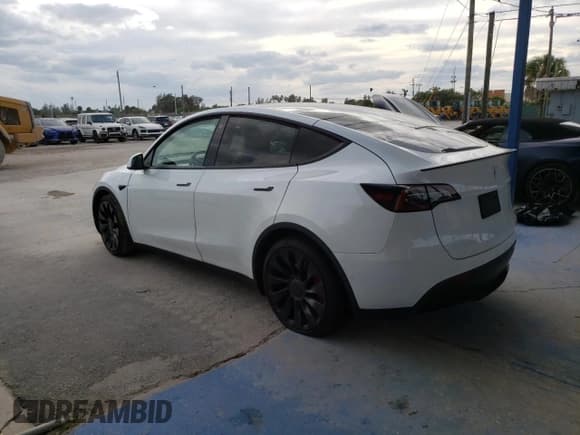 ✅ 2022 Tesla Model Y Performance • VIN: 7SAYGDEF0NF513165 • Lot: 91053705. Listed on Copart with 46,647 mi. Free auction sales archive from the USA and detailed vehicle history report at DreamBid. Image 2.