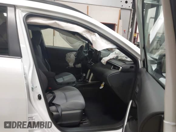 ✅ 2025 Toyota Corolla Cross Hybrid S • VIN: 7MUFBABG6SV073108 • Lot: 42275782. Listed on IAAI with 1,152 mi. Free auction sales archive from the USA and detailed vehicle history report at DreamBid. Image 5.