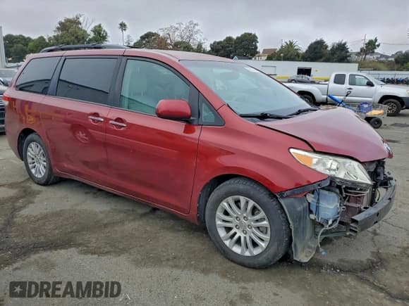 ✅ 2012 Toyota Sienna XLE • VIN: 5TDYK3DC0CS197935 • Lot: 96114475. Listed on Copart with 154,410 mi. Free auction sales archive from the USA and detailed vehicle history report at DreamBid. Image 4.