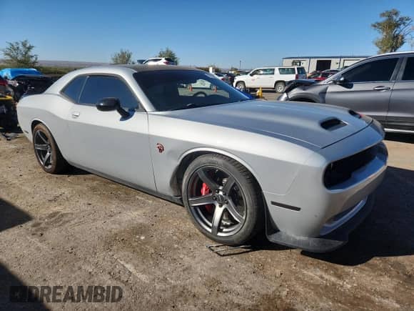 2019 Dodge Challenger SRT Hellcat с VIN 2C3CDZC99KH759457, выставлен на аукционе Copart как лот 87033995 с пробегом 33 883 миль миль и Списание • Salvage title. История ставок и продаж доступна на DreamBid. Изображение 4.