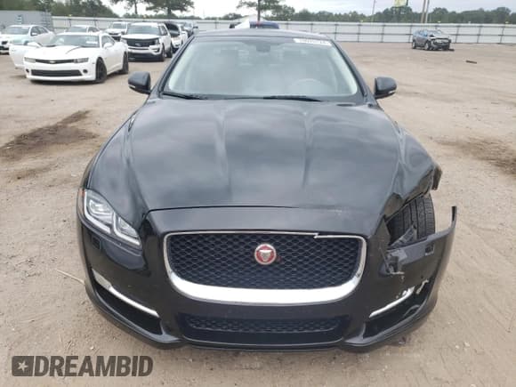 ✅ 2017 Jaguar XJ R-Sport • VIN: SAJWA1C73H8W10544 • Lot: 70025724. Listed on Copart with 64,437 mi. Free auction sales archive from the USA and detailed vehicle history report at DreamBid. Image 5.