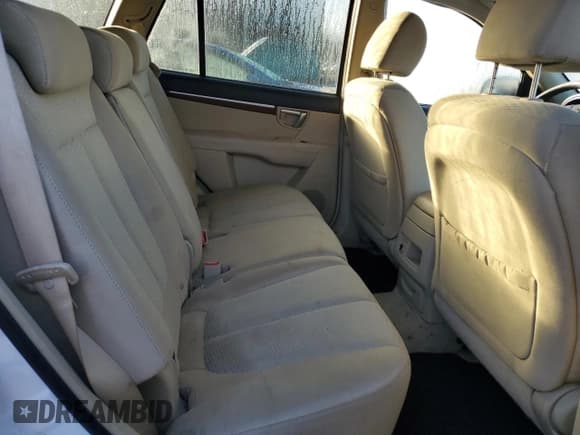 ✅ 2009 Hyundai Santa Fe GLS • VIN: 5NMSG13D09H330355 • Lot: 86271174. Listed on Copart with 150,269 mi. Free auction sales archive from the USA and detailed vehicle history report at DreamBid. Image 11.