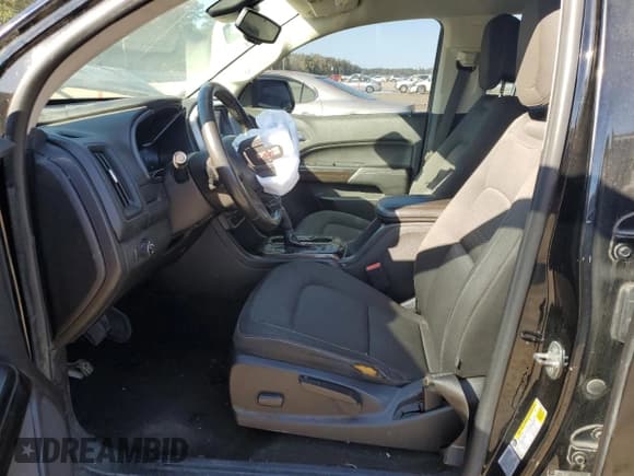 ✅ 2015 GMC Canyon 2WD SLE • VIN: 1GTG5BEA5F1117315 • Lot: 89518975. Listed on Copart with 91,662 mi. Free auction sales archive from the USA and detailed vehicle history report at DreamBid. Image 7.