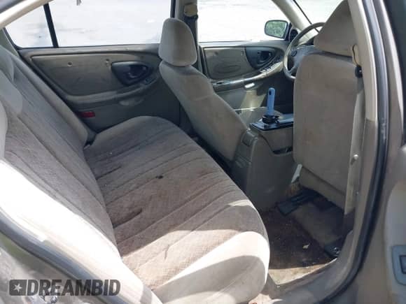 2000 Chevrolet Malibu z VIN 1G1ND52J3Y6351094, wystawiony jako IAAI lot #42703471 z przebiegiem 297 098 mil mil oraz . Historia ofert i sprzedaży dostępna na DreamBid. Obrazek 8.