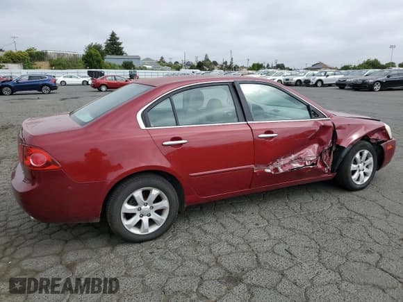 ✅ 2007 Kia Optima EX • VIN: KNAGE124975094136 • Lot: 59787515. Wystawiony na Copart z przebiegiem 120 217 mil. Bezpłatny archiwum sprzedaży aukcyjnych z USA i szczegółowy raport historii pojazdu na DreamBid. Zdjęcie 3.