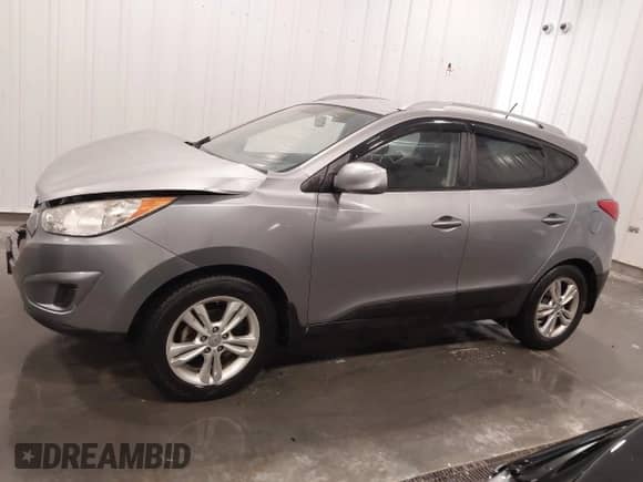 2011 Hyundai Tucson GLS z VIN KM8JU3AC7BU262415, wystawiony jako IAAI lot #43439786 z przebiegiem 88 234 mil mil oraz . Historia ofert i sprzedaży dostępna na DreamBid. Obrazek 14.